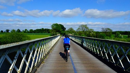 Rolling over the wooden toll bridge at Aldwark