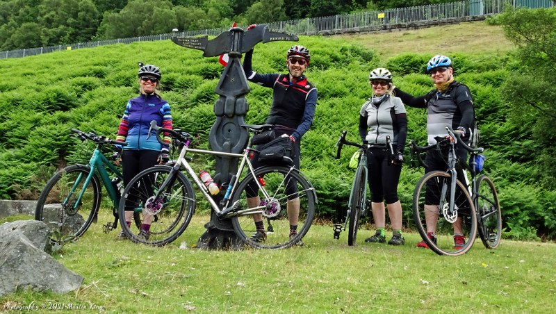 Team photo at the Sustrans sign outside Elan Village