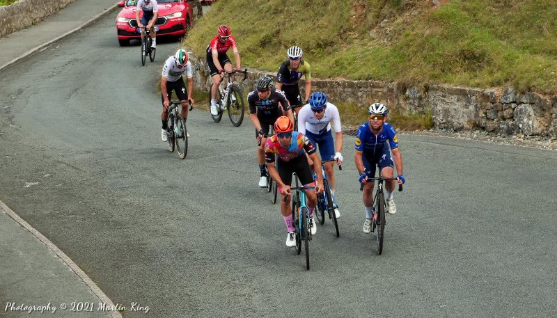 Mark Cavendish leads a small grupetto up Marine Drive