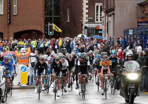 The peloton heads out of Carlisle